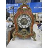A continental design mantel clock with applied  gilt mounts  height 23ins