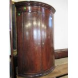 WITHDRAWN A Georgian bow fronted corner cupboard width 26ins, height 41ins