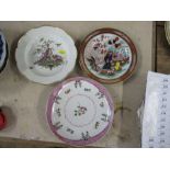 Three 19th century English porcelain cabinet plates, one decorated with fabulous birds with basket