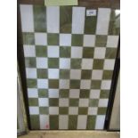 A marble table top, with chequer board design