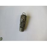 A silver filigree sewing aid, fitted with a cloth tape measure, screw off thimble and scent bottle -