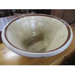 A large pottery bowl dimeter 23.5 ins height 12ins