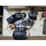 A collection of vintage cameras, to include Pentax, Praktica