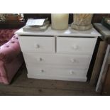 A white painted chest of drawers, width 40ins, height 32ins