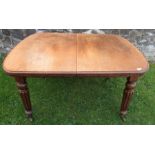 A 19th century dining table with reeded legs, 52ins x 41ins, height 29ins