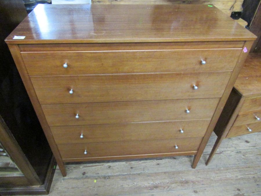 A Gordon Russell of Broadway chest of drawers together with a matching dressing table. Chest of
