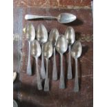 Nine silver tea spoons, eight with bright cut decoration