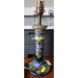 A Moorcroft Pottery candlestick lamp base, decorated in the Violet pattern, height 12ins