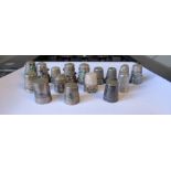 A collection of white metal thimbles, some set with stones, some with Niello decoration