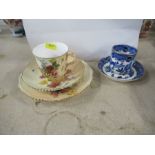 A Royal Worcester blush ivory trio, the cup, saucer and plate decorated with flowers, together