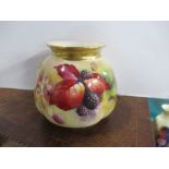 A Royal Worcester vase, decorated with autumnal fruits and leaves by Kittle Blake - chip to rim