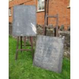 Two chalk boards and stands