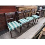 Four Regency mahogany dining chairs