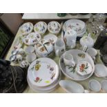 A collection of Royal Worcester Evesham pattern china together with napkins and mats