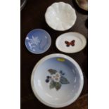 A Royal Worcester dish, decorated with a butterfly, together with another Royal Worcester dish and