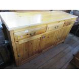 A large pine side board , width 67ins, depth 24ins, height 36ins