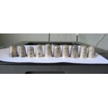 Ten hallmarked sliver thimbles, to include Charles Horner