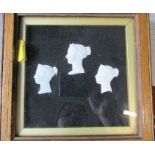 Three framed cameo plaques, of Queen Victorian, together with two Royal Commemorative tiles and a