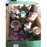 Two boxes of assorted china and glass to include ornaments, clock, paper weights etc