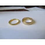 A 22ct gold wedding band, weight 2.3g, together with a 9ct gold wedding band, weight 3g