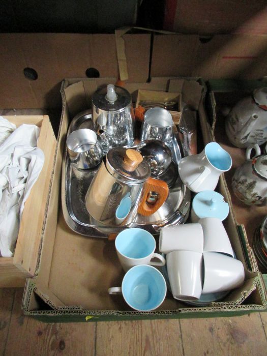 A silver plated coffee set, together with Poole pottery coffee cups and a jug