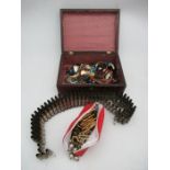 A bullet belt together with a quantity of costume jewellery in (two boxes)