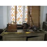 An oak coal scuttle, together with a copper example, warming pan, pump and brass fire surround