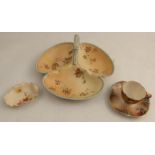 A Graingers Worcester blush ivory hors d'oeuvre dish, decorated with flowers, together with a