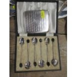 A cased set of six silver coffee bean spoons, together with a silver cigarette case, with