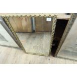 A gilt framed mirror