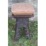 An Antique oak stool, of Moorish design, with carved decoration, height 20.5ins, top 10ins x 10ins