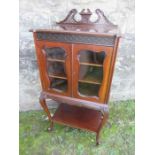 An Edwardian mahogany music cabinet width 22ins height 44 ins