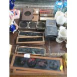 A collection of Victorian and later Magic lantern slides to include mahogany framed examples stamped