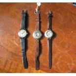 A World War One silver cased half hunter wrist watch, with enamel dial, together with another silver
