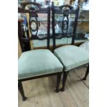 A pair of Edwardian style chairs