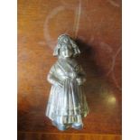 A Dutch silver pepperette, in the form of a Dutch lady in bonnet and traditional dress, import