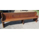 A pitch pine church pew, length 101ins, height 32ins, height to seat 17ins