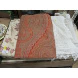 A paisley shawl and other items