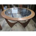 A retro style glass topped coffee table, diameter 33ins