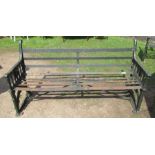 A 19th century Hardy & Padmore Ltd Worcester painted cast iron bench, with slats to seat and back,