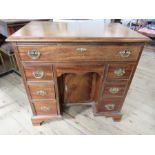 A 19th century mahogany knee hole desk, width 31ins, depth 19ins, height 30.5ins