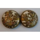 A Satsuma porcelain two piece belt buckle, each circular piece with enamel and gilt floral