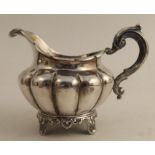 A Victorian silver jug, with gadrooned body, London 1840, weight 6oz