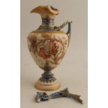 A Royal Worcester ewer, decorated with enamelled leaves, shape number 1309, af - handle broken and