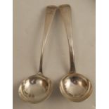 Two silver ladles, one engraved with an initial, the other with a crest, London 1800 and 1820