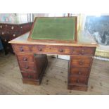 A 19th century mahogany twin pedestal desk, with rising writing slope, width 42ins, height 29ins,