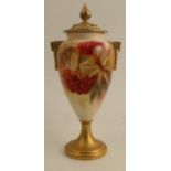 A Royal Worcester covered vase, decorated with with fruits and leaves to the front by Kitty Blake,