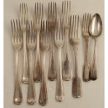 Seven thread pattern dinner forks, engraved with a crest, various dates, weight 16oz, together