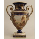An early 19th century Bloor Derby twin handled pedestal vase, decorated with A View in Wales, to a