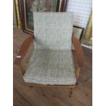 A mid century reclining armchair